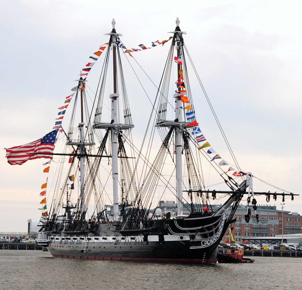 USS Constitution returns to her pier after an underway to celebrate her 213th launching day anniversary