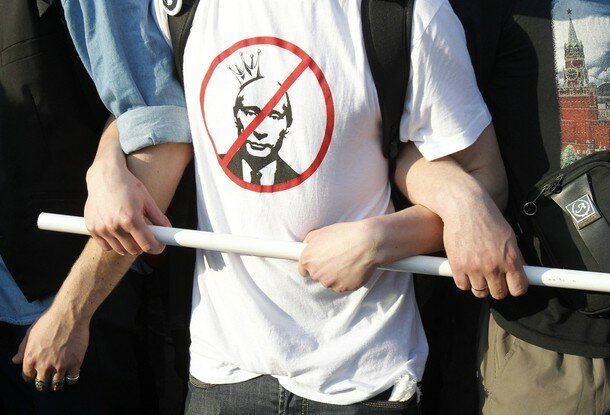 A protester wearing an anti-Putin tshirt takes part in the 