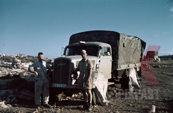 stock-photo-german-afrika-korp-soldiers-in-front-of-a-supply-truck-north-africa-1942-9875.jpg