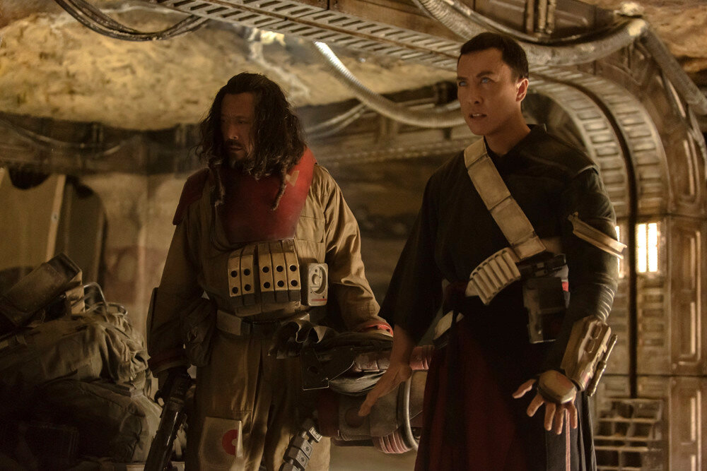 Rogue One: A Star Wars Story..L to R: Baze Malbus (Jiang Wen) and Chirrut Imwe (Donnie Yen)..Ph: Giles Keyte..© 2016 Lucasfilm Ltd. All Rights Reserved.