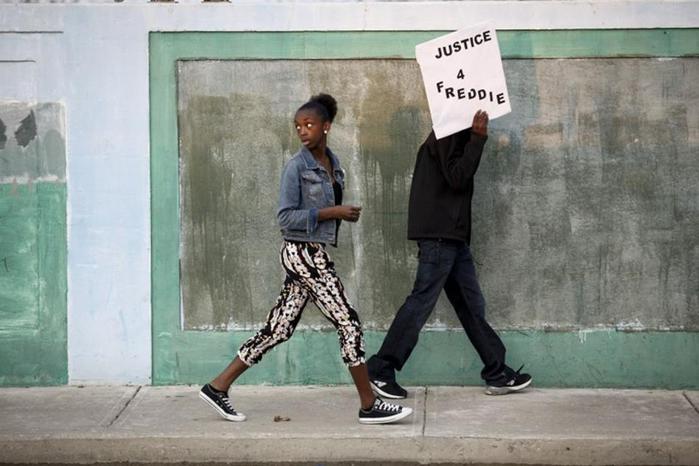 Самые яркие фотографии акций протеста после гибели Фредди Грея в Балтиморе