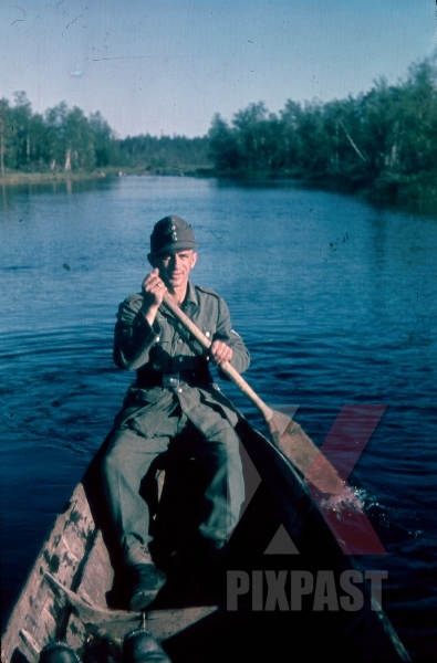 stock-photo-134th-gebirgsjgvger-finland-1944-german-soldier-in-boat-on-river-9204.jpg