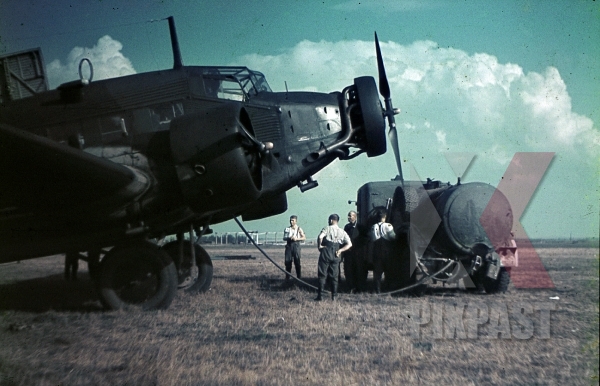 stock-photo-ww2-color-hitler-private-junkers-52-transport-plane-petrol-tanker-truck-ground-crew-ukraine-1941-7928.jpg