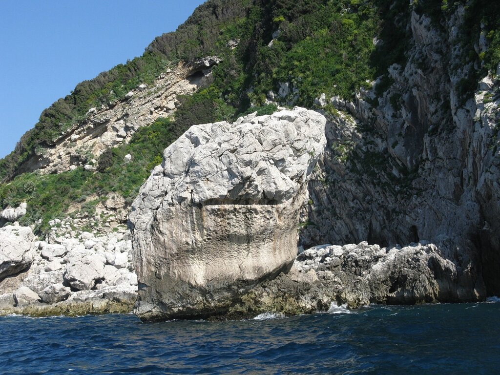 By boat along the cliffs of Capri island