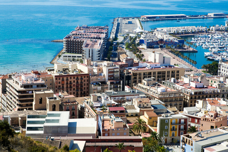 View of harbour with Castle of Santa Barbara in background. Alicante